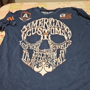 American Customs Skull Graphic Tee - Blue with Orange & White Print.affliction